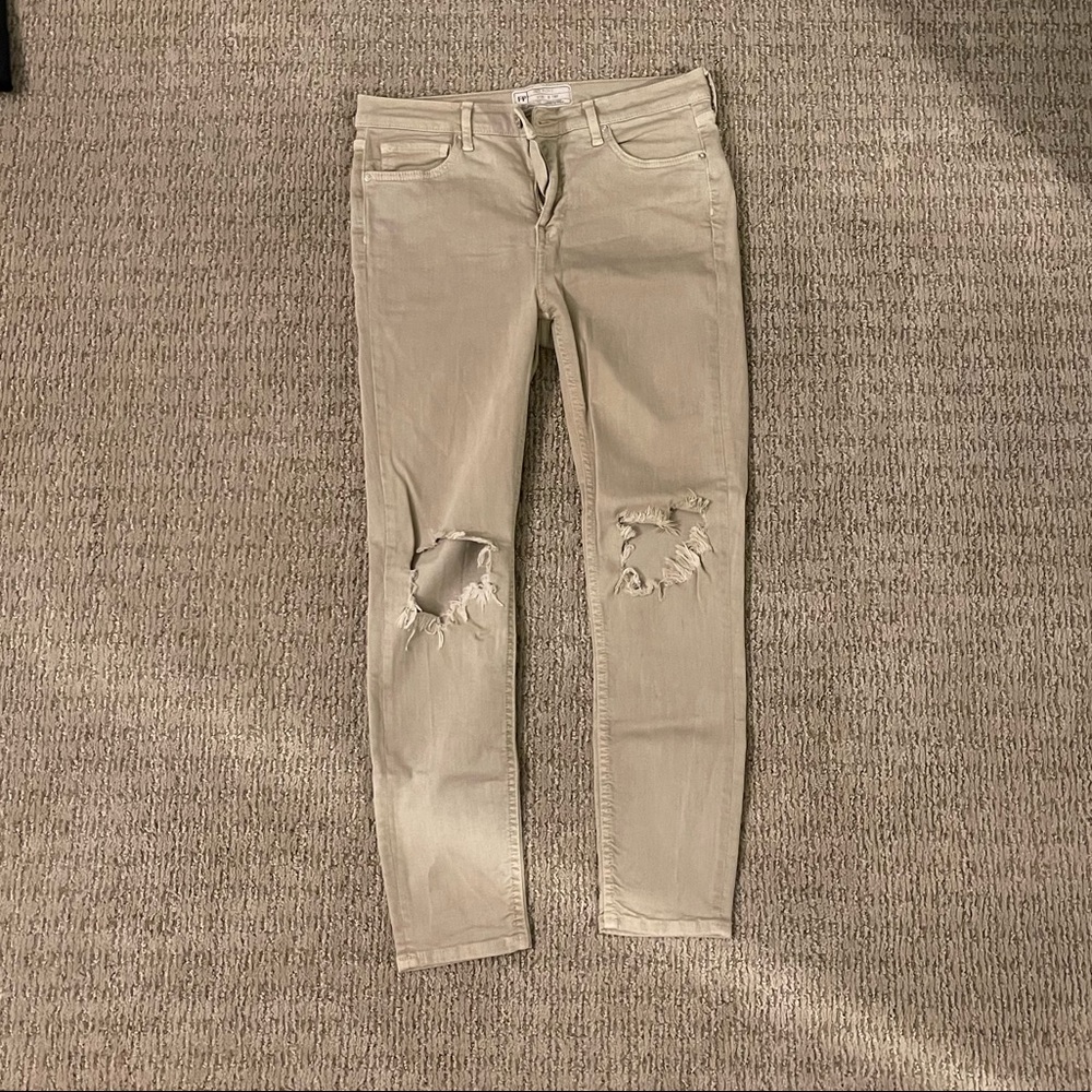 Free people skinny jeans with busted knees